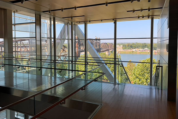 Looking out window of Clinton Presidential Library