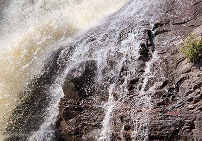Water flows over rock