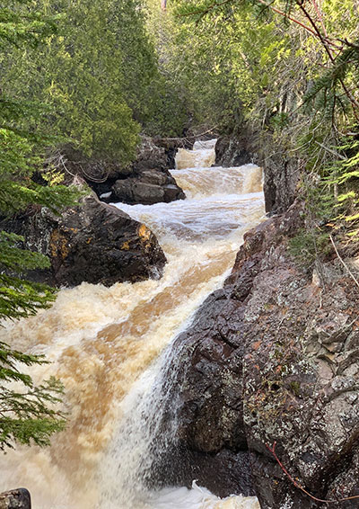 Water flows down river