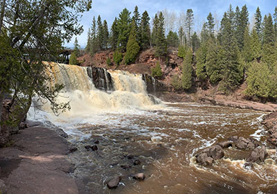 Waterfall as water rushes over it