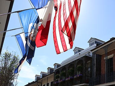 Flags hang along street