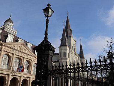 Street lamp on Jackson Square with cathedral in the distance