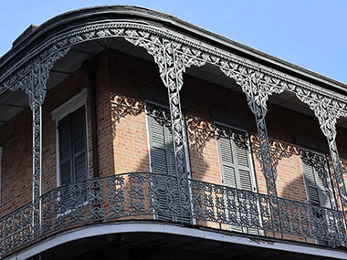 Sun shines on metal balcony