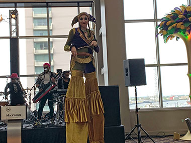 Woman on stilts