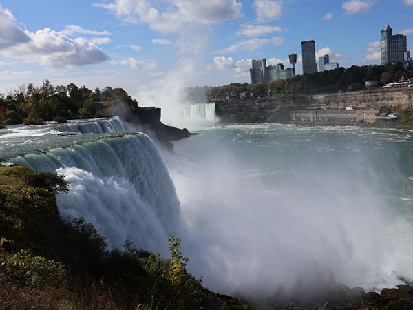 Niagara Falls from American side as mist rises