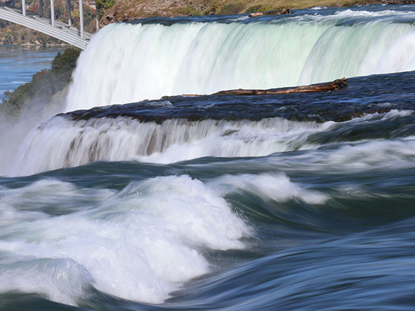 Extreme Close up of water flowing over Niagara Falls on American side