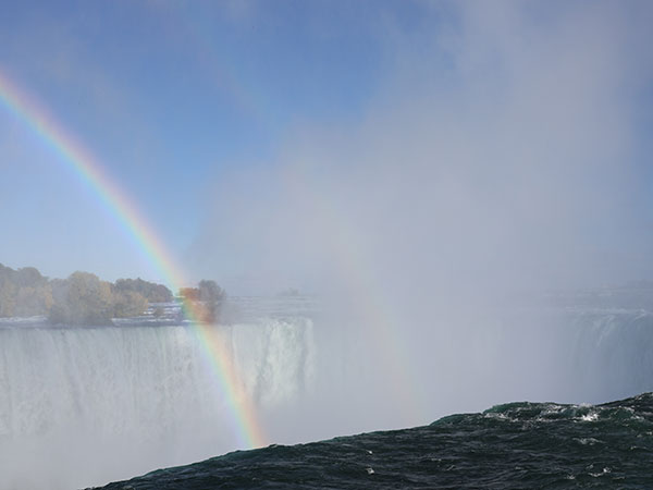 Rainbow over waterfall