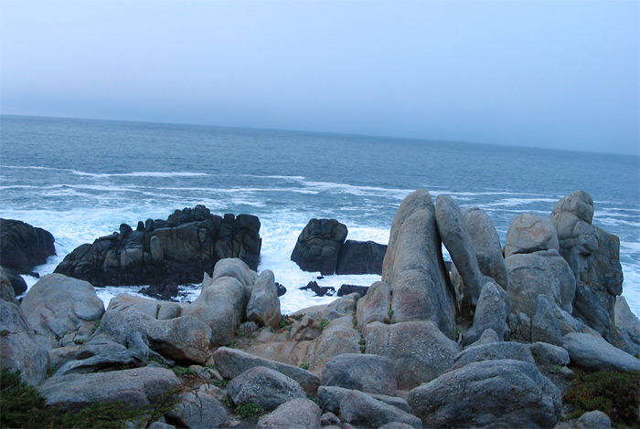 Water with rock in the foreground on Seventeen Mile Drive