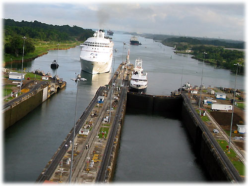 Two boats prepare to enter locks