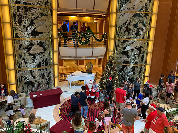 Santa giving out toys to kids