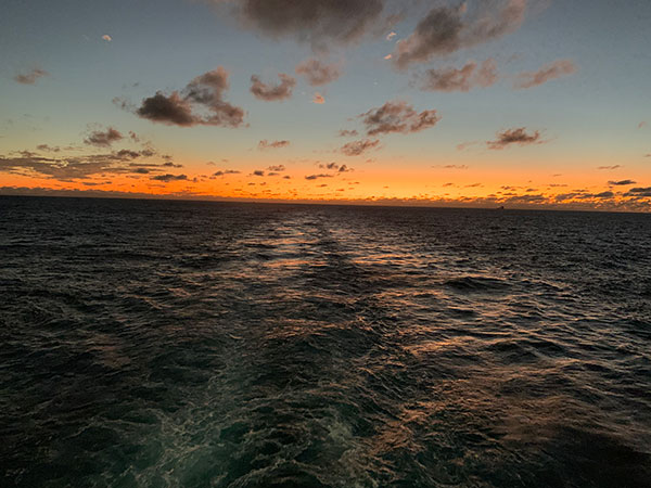 Sunset over water on December 27