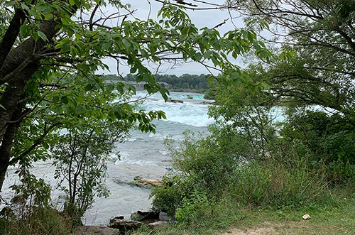 Path along the river leading to the falls